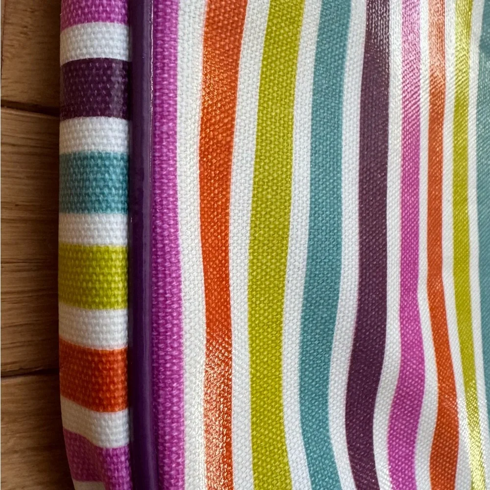 Striped Padded Laptop Sleeve - Multicolor with orange padded lining.